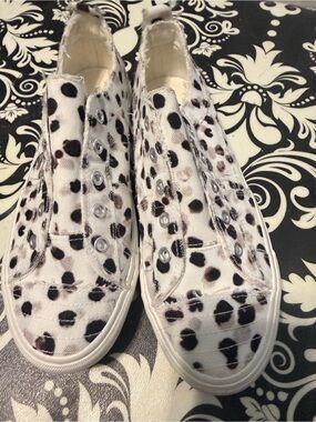 Corkys White Slip-On Canvas Sneakers with Black Leopard Spots